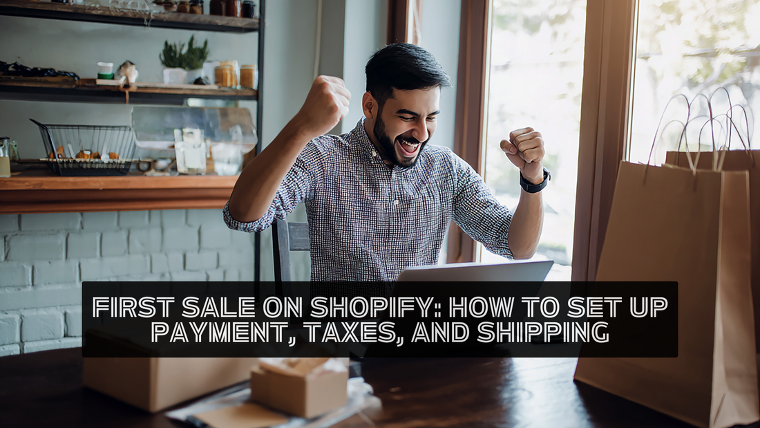 Excited business owner celebrating first Shopify sale while sitting at a desk with a laptop and shopping bags, with text overlay reading “First Sale on Shopify: How to Set Up Payment, Taxes, and Shipping.”
