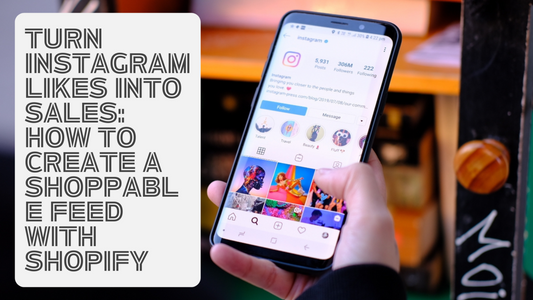 Hand holding smartphone with Instagram app open, displaying a colorful profile and grid feed, with overlay text that reads "Turn Instagram Likes Into Sales: How to Create a Shoppable Feed with Shopify